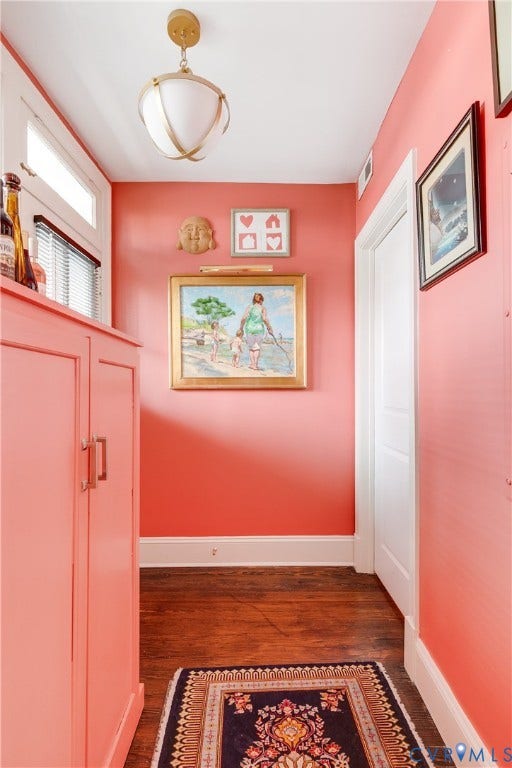 3006 Monument Avenue, #U2W, Museum District, Richmond, VA 23221 Hallway with wood-finish flooring and a built-in storage cabinet