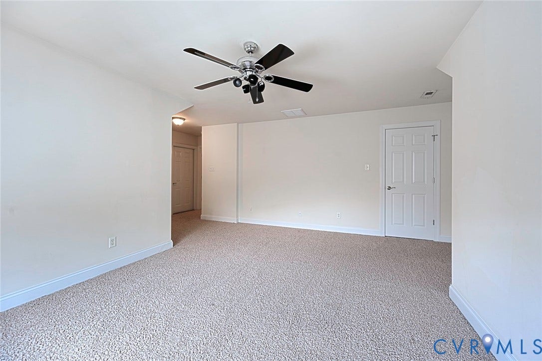4309 Village Creek Drive, Chester, VA 23831 Carpeted room featuring a ceiling fan with light fixture, white walls, and white baseboards