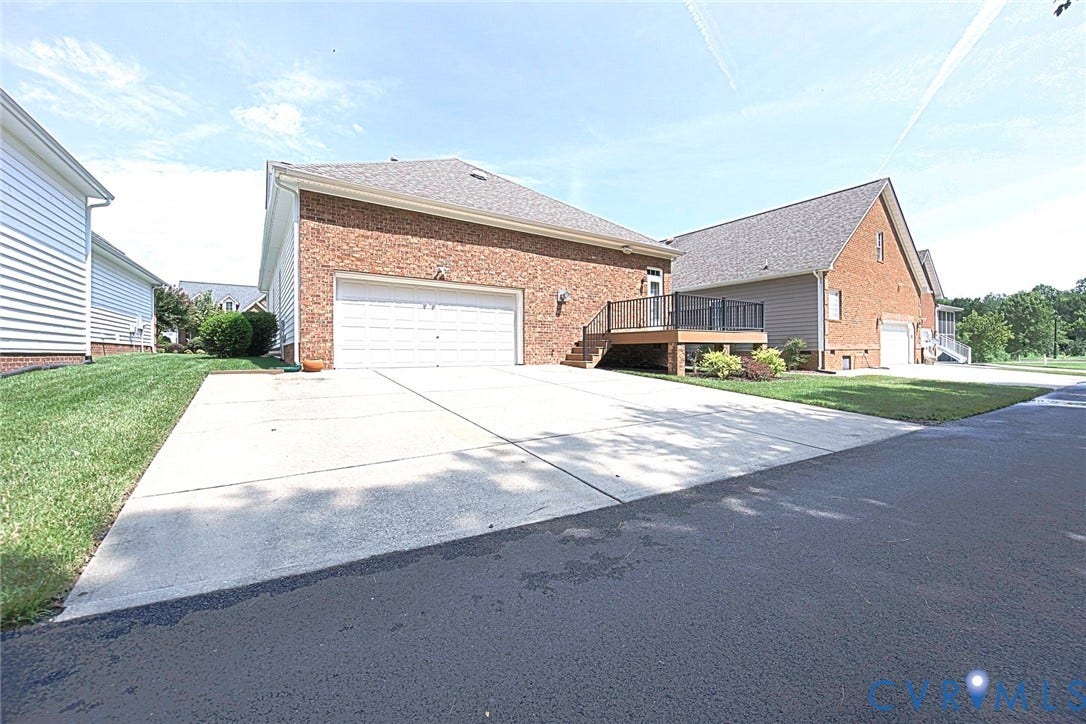 4309 Village Creek Drive, Chester, VA 23831 rear with 2 car garage, extra wide driveway