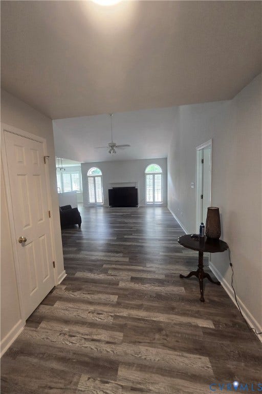 12812 Winfree Street, Chester, VA 23831 Spacious room featuring wood-vinyl plank flooring, vaulted ceiling,