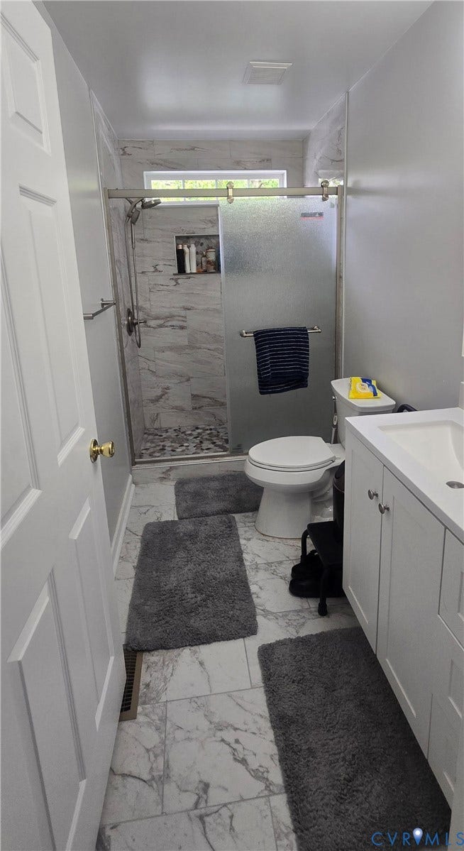 12812 Winfree Street, Chester, VA 23831 Ceramic tile flooring and shower, new vanity, higher toilet, nickel faucet, renovated last year