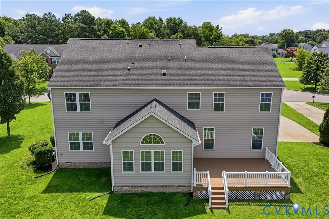 1819 White Mountain Drive, Mount Blanco On The James, Chester, VA 23836 Rear exterior featuring a sunroom addition and a multi-level deck with white railings