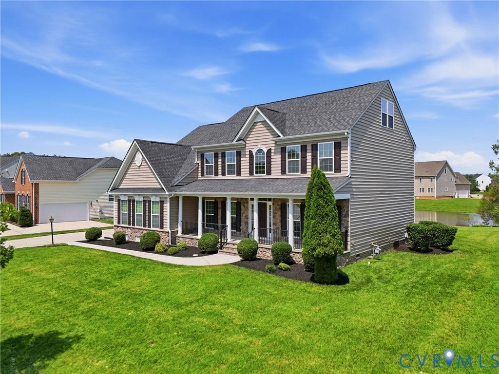 1819 White Mountain Drive, Mount Blanco On The James, Chester, VA 23836 Two-story home featuring siding and stone veneer exterior