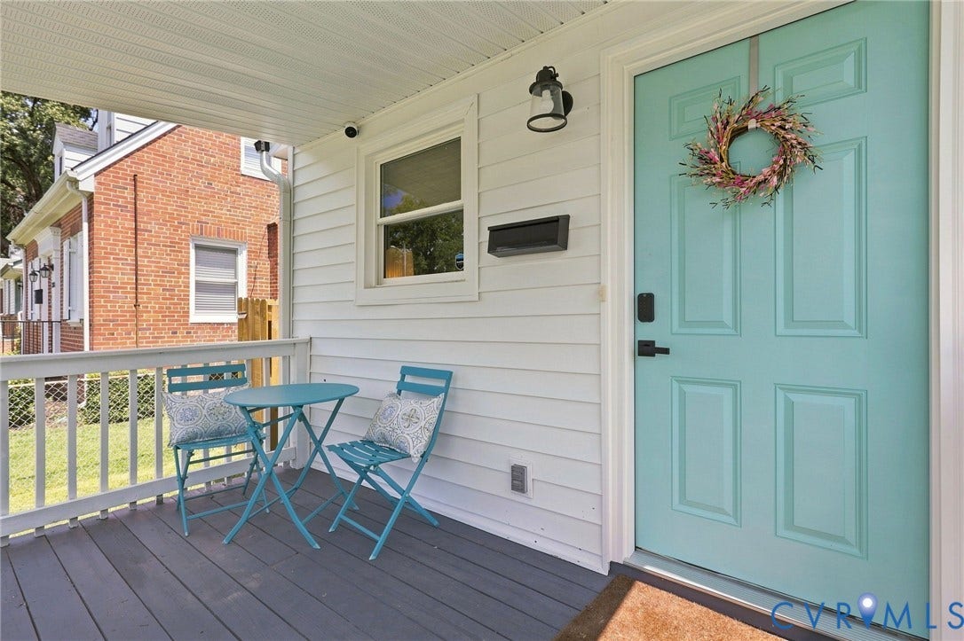 Front porch perfect for coffee in the morning!!