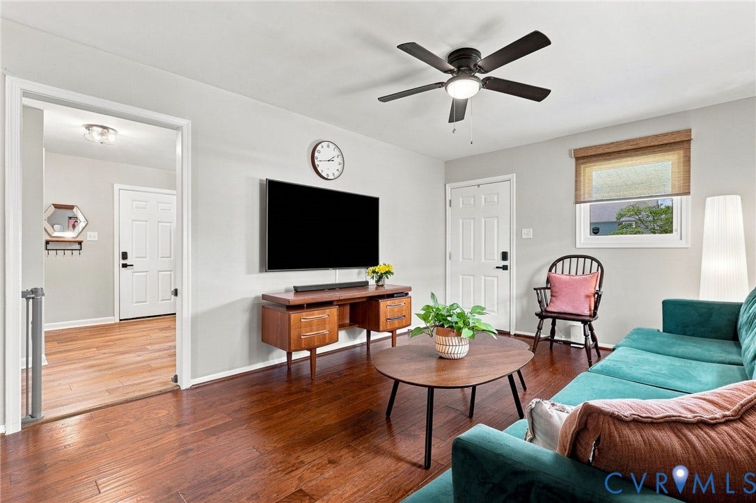 with hardwood floors and neutral paint.