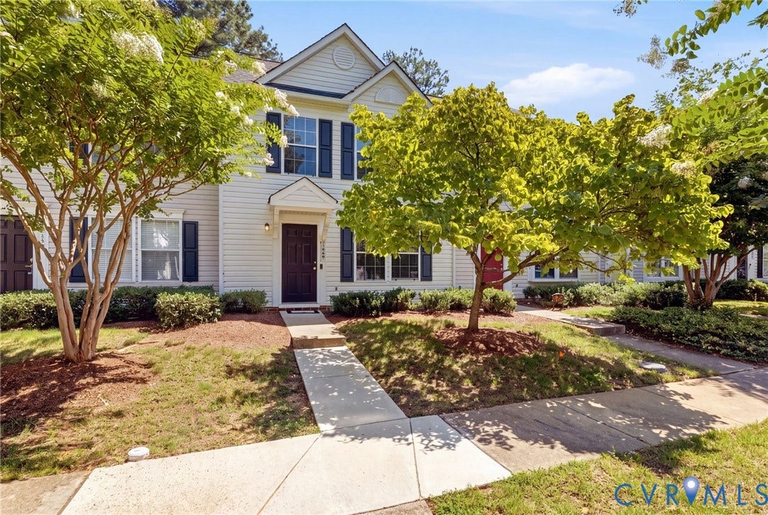 1840 Timberly Waye, Henrico, VA 23238 Cream-colored siding exterior featuring dark shutters, a dark entry door, and a covered porch