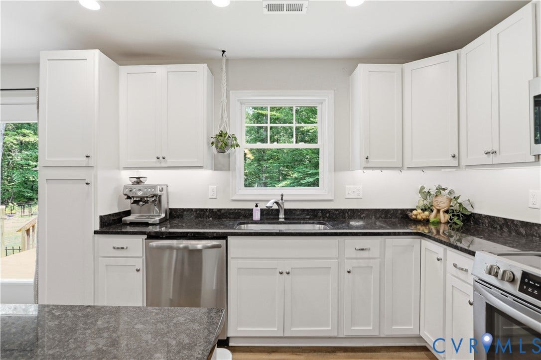 4939 Shannon Hill Road, Kents Store, VA 23084 Open kitchen with views of the backyard