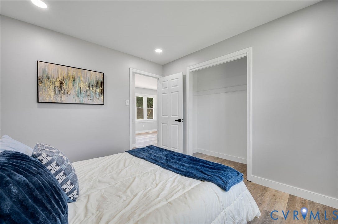 3508 Jefferson Landing Road, #R, Powhatan, VA 23139 Recessed lighting, light gray wall paint, wood-finish flooring, white interior doors, and a closet with white trim