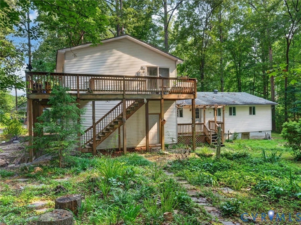 Multi-level deck with wood railings and stairs