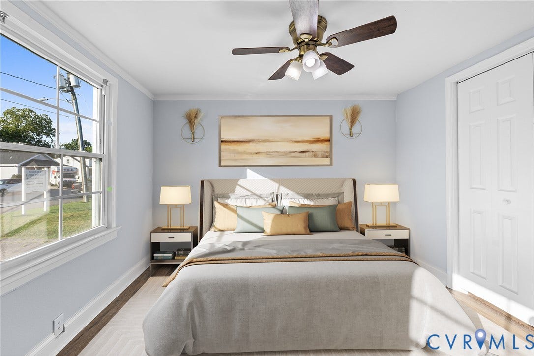 3516 Virginia Street, Woodlawn, Hopewell, VA 23860 (Virtually-Staged) Ceiling-mounted fan with integrated lighting, wood-finish flooring, and a window with white sashes