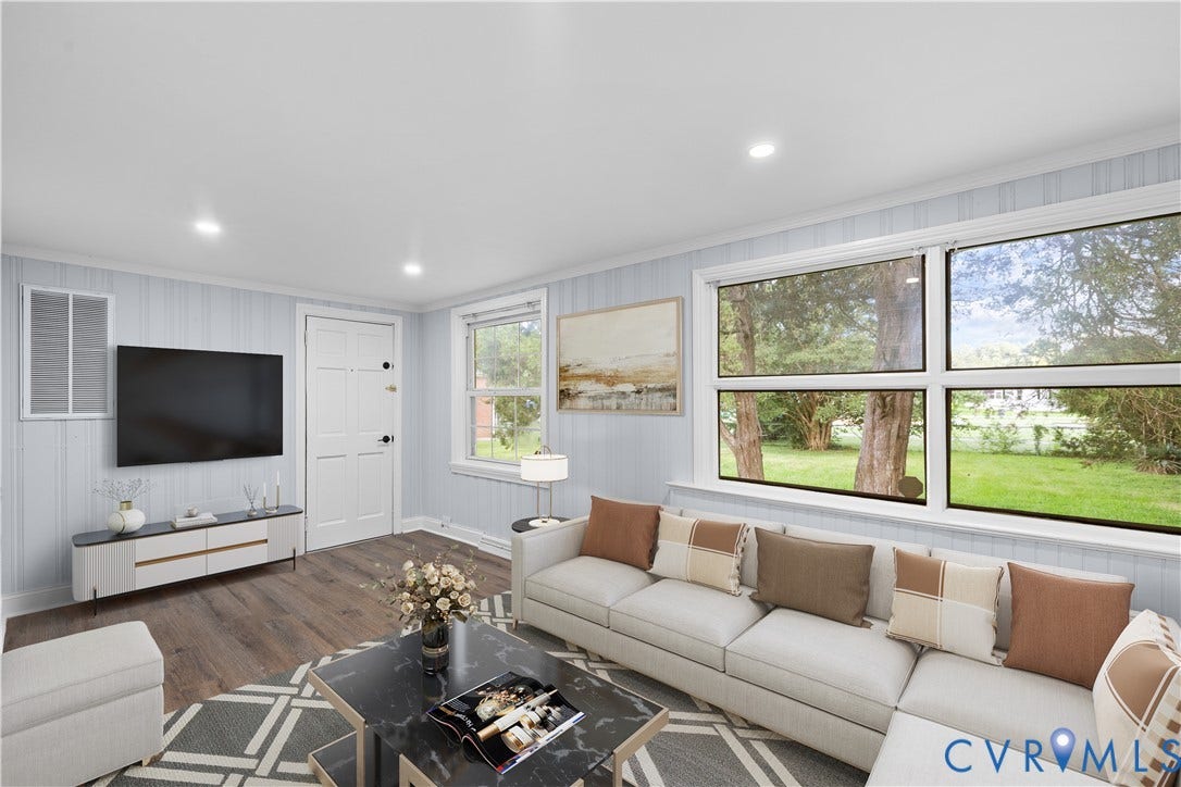 3516 Virginia Street, Woodlawn, Hopewell, VA 23860 (Virtually-Staged) Spacious living area featuring wood-finish flooring, recessed lighting, and expansive windows