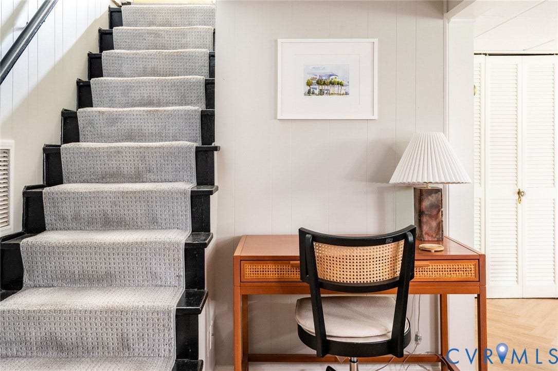 3912 Park Avenue, Malvern Gardens, Richmond, VA 23221 Gray carpeted staircase with black risers and a white paneled wall