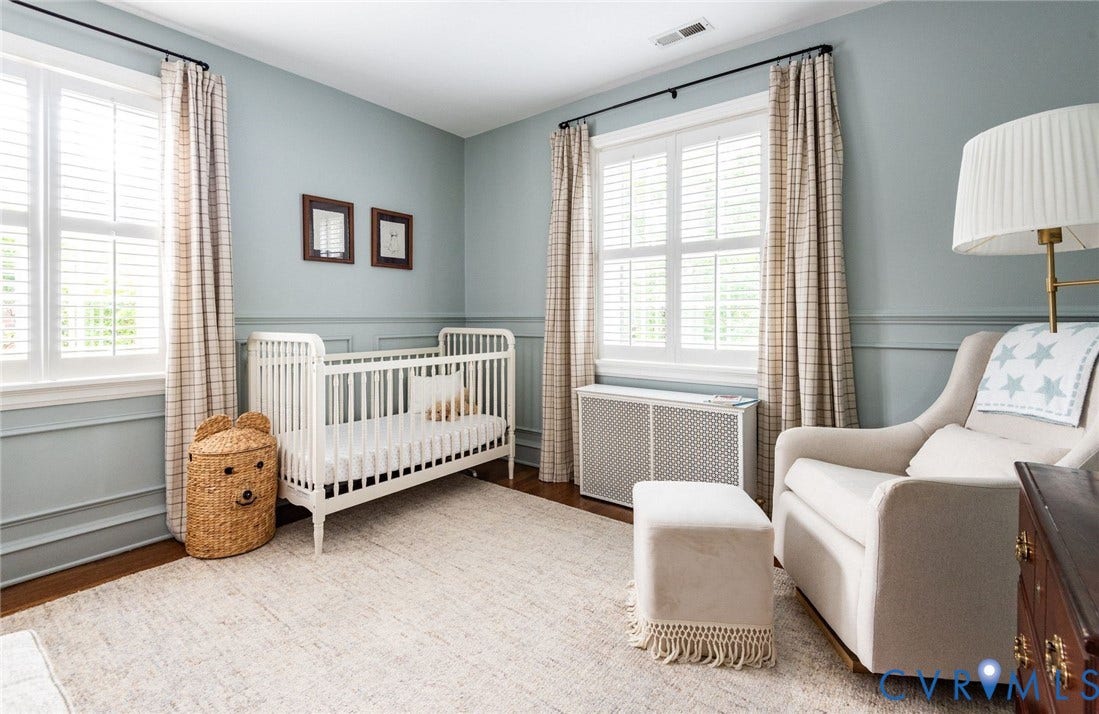 3912 Park Avenue, Malvern Gardens, Richmond, VA 23221 Bedroom featuring two windows w/ plantation shutters, custom wall paneling, fresh paint, built-in shelf and hardwood flooring