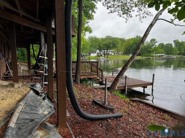 35 Lake Drive, Columbia, VA 23038 Waterfront property featuring a private wooden deck and dock