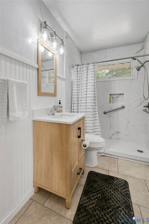 1910 Fon Du Lac Road, Henrico, VA 23229 Light wood-finish vanity with a white countertop and rectangular sink
