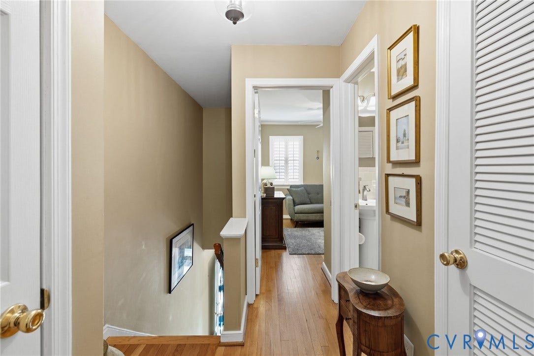 Hardwood flooring throughout the hallway