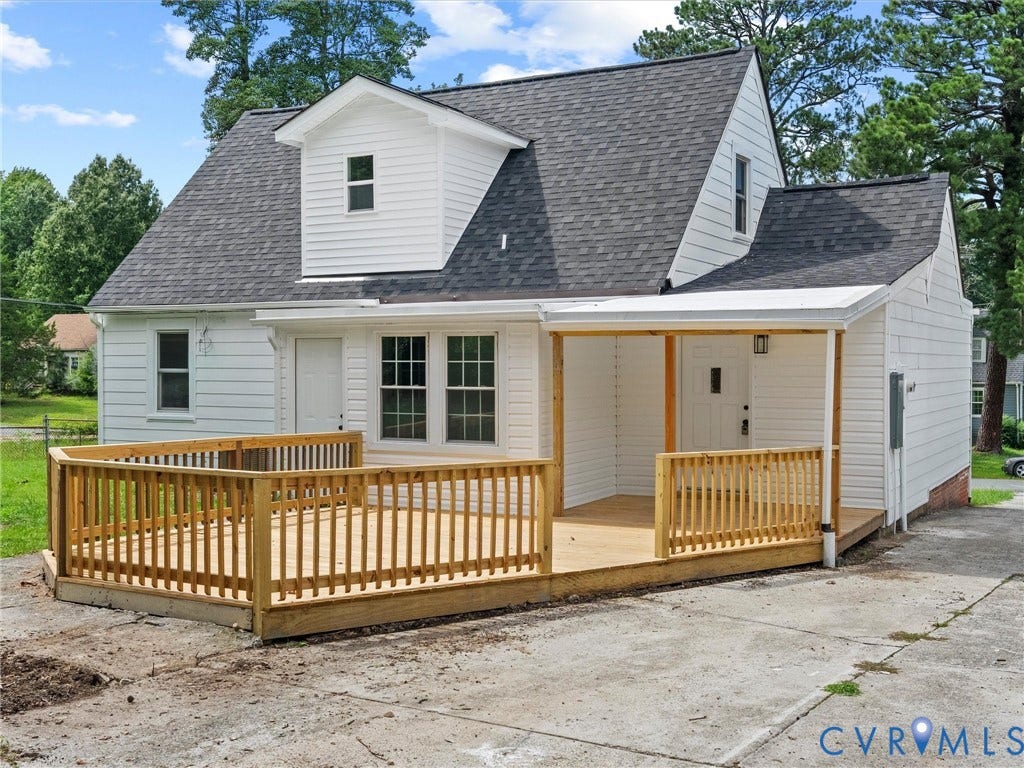 507 Grayson Avenue, Richmond, VA 23222 Exterior featuring white siding, a dark shingle roof, and multiple windows