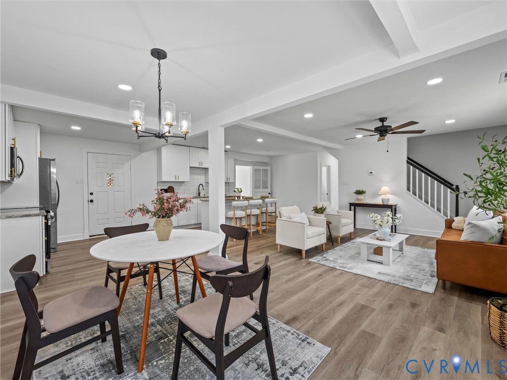 507 Grayson Avenue, Richmond, VA 23222 Open-concept living space featuring wood-finish flooring, recessed lighting, and a modern chandelier