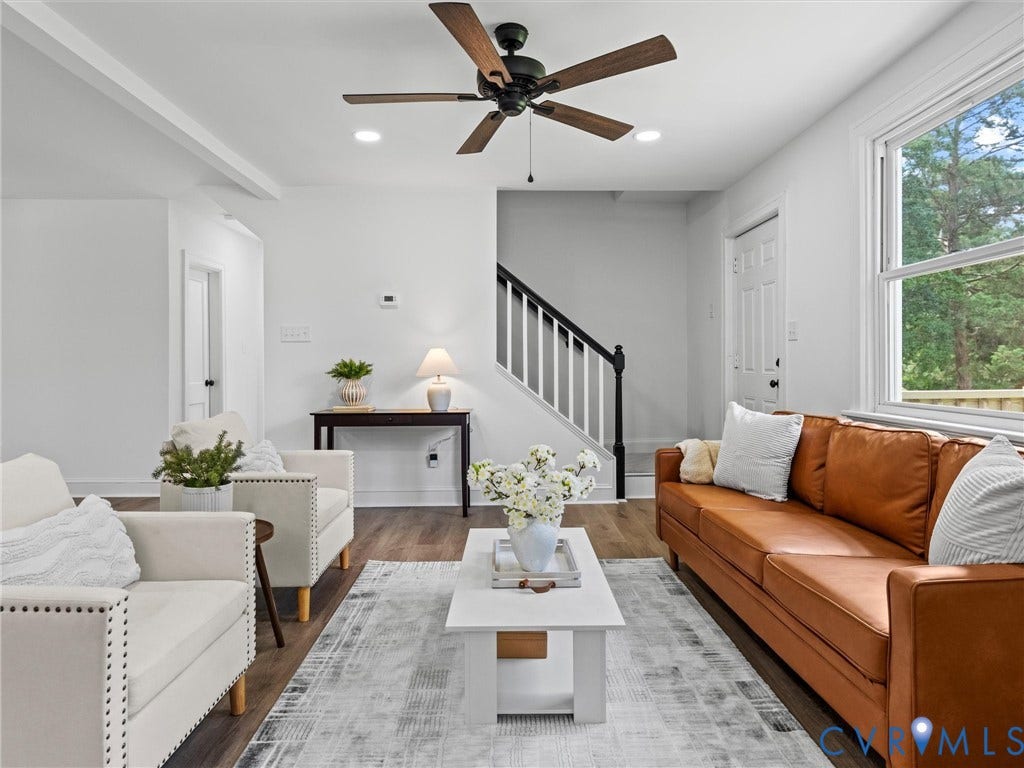 507 Grayson Avenue, Richmond, VA 23222 Spacious living area featuring wood-finish flooring, a ceiling fan with integrated lighting, recessed lighting, and a prominent window