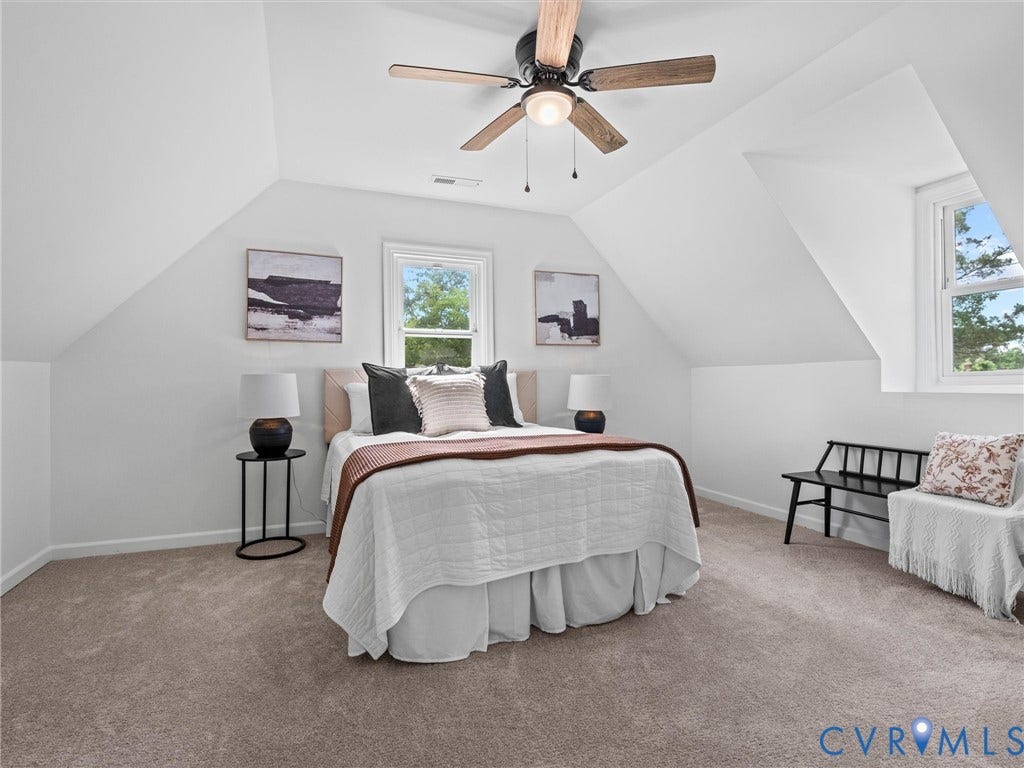 507 Grayson Avenue, Richmond, VA 23222 Carpeted room featuring a sloped ceiling, double-paned window, and a ceiling fan with light fixture