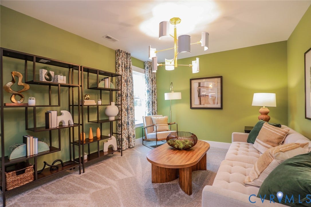 Sitting Room attached to the primary bedroom. This home is MOVE-IN READY! The photo represents the actual home.
