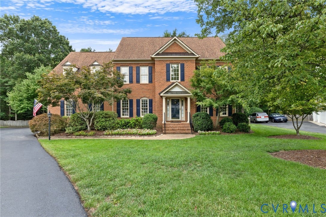 12305 Bradford Landing Way, Wyndham, Glen Allen, VA 23059 Traditional brick colonial residence with a gabled roof and dormer windows