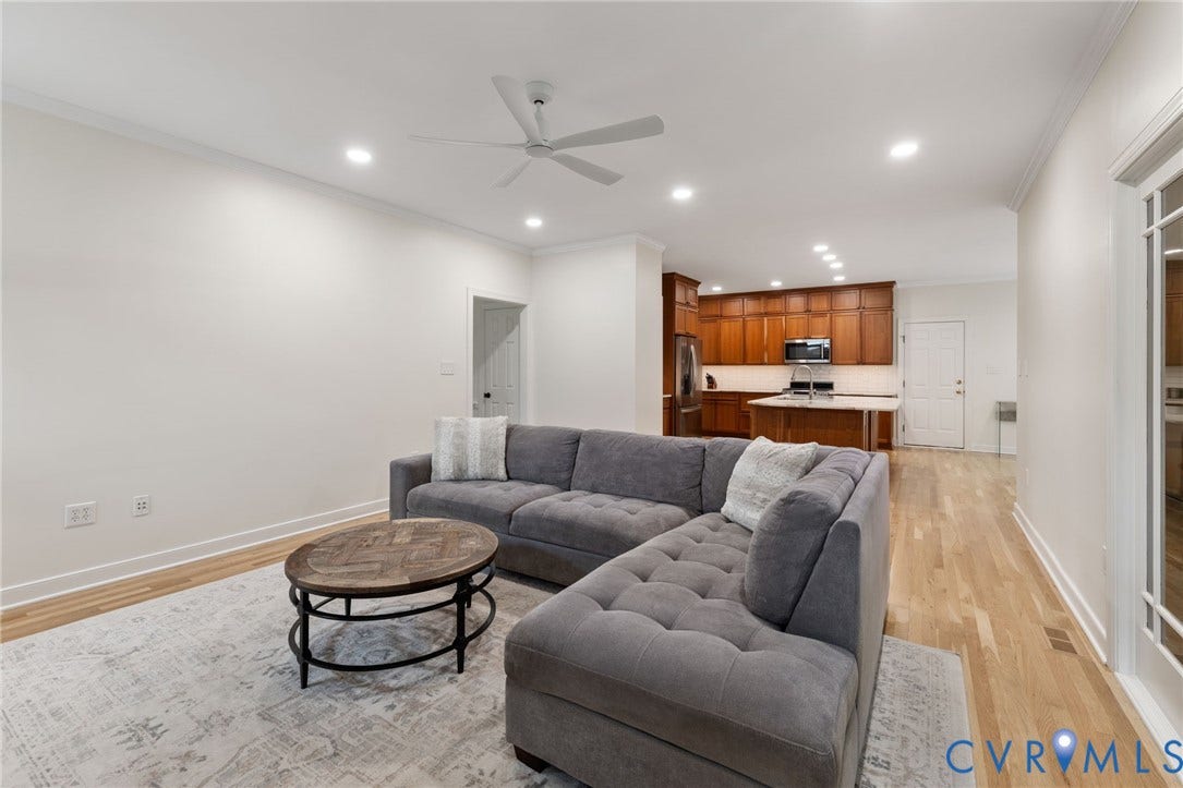 12305 Bradford Landing Way, Wyndham, Glen Allen, VA 23059 Open-concept living space featuring wood-finish flooring, recessed lighting, and a ceiling fan