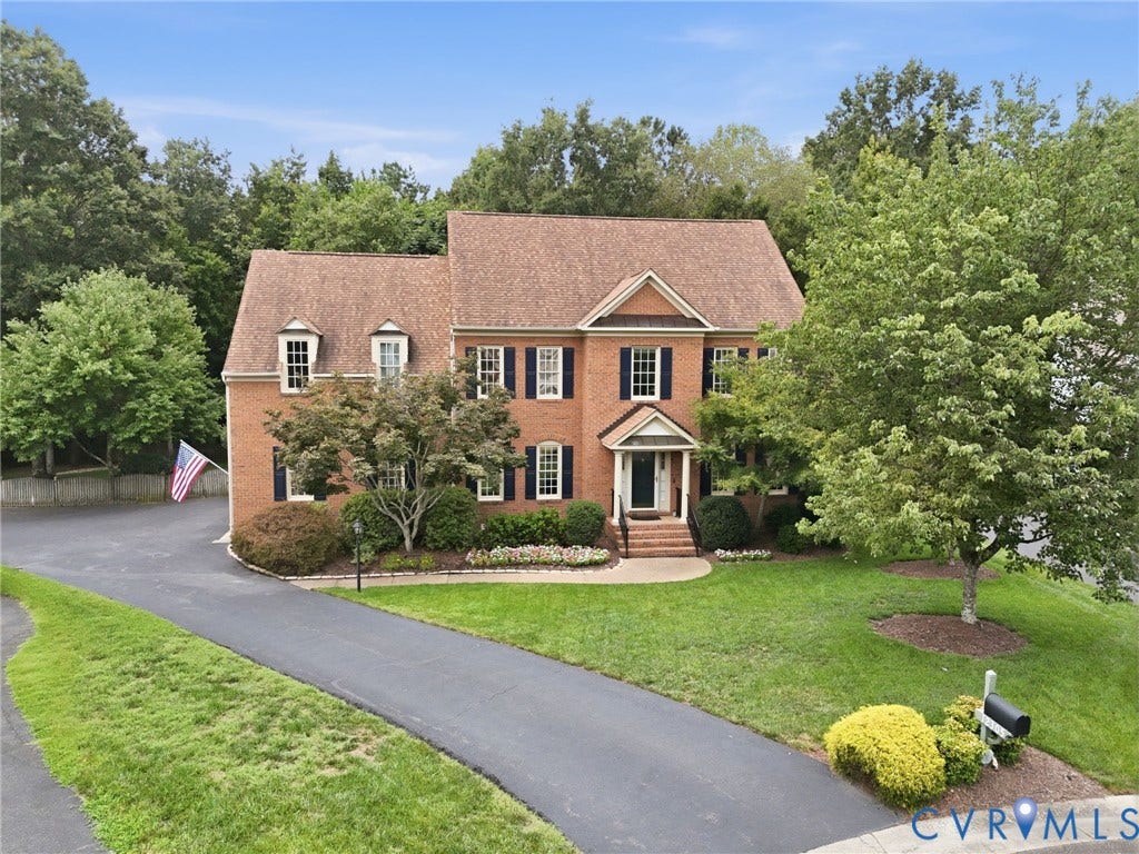 12305 Bradford Landing Way, Wyndham, Glen Allen, VA 23059 Traditional brick colonial residence featuring a gabled roof, dormer windows, and dark shutters