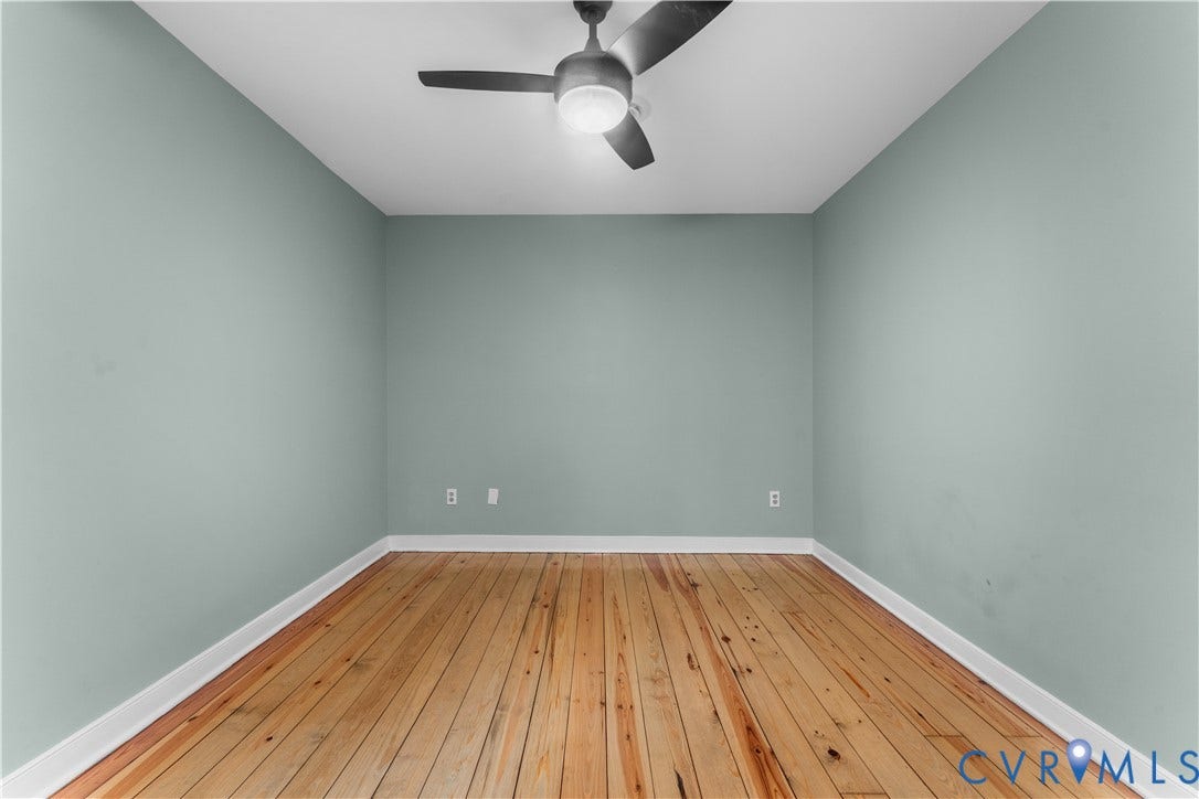 3927 Hughes Creek Road, Powhatan, VA 23139 Hardwood flooring, light blue wall paint, white trim, and a ceiling fan with integrated lighting