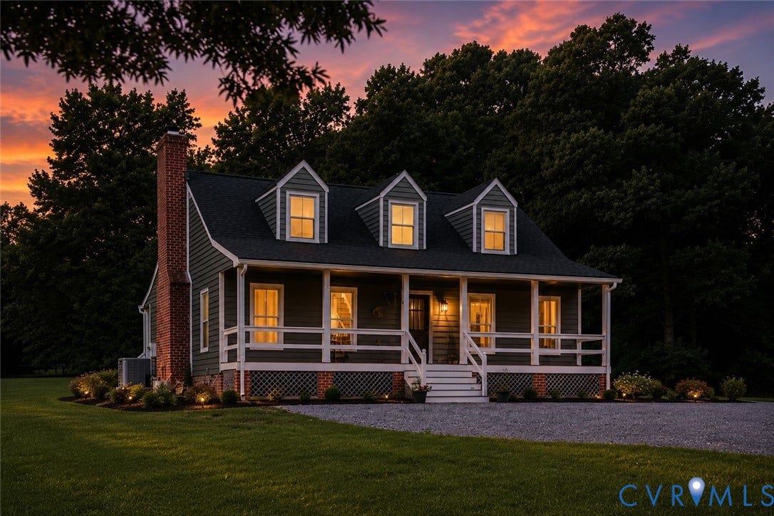 3927 Hughes Creek Road, Powhatan, VA 23139 Cape Cod style residence featuring dark siding, a covered front porch with white railings, and three dormer windows