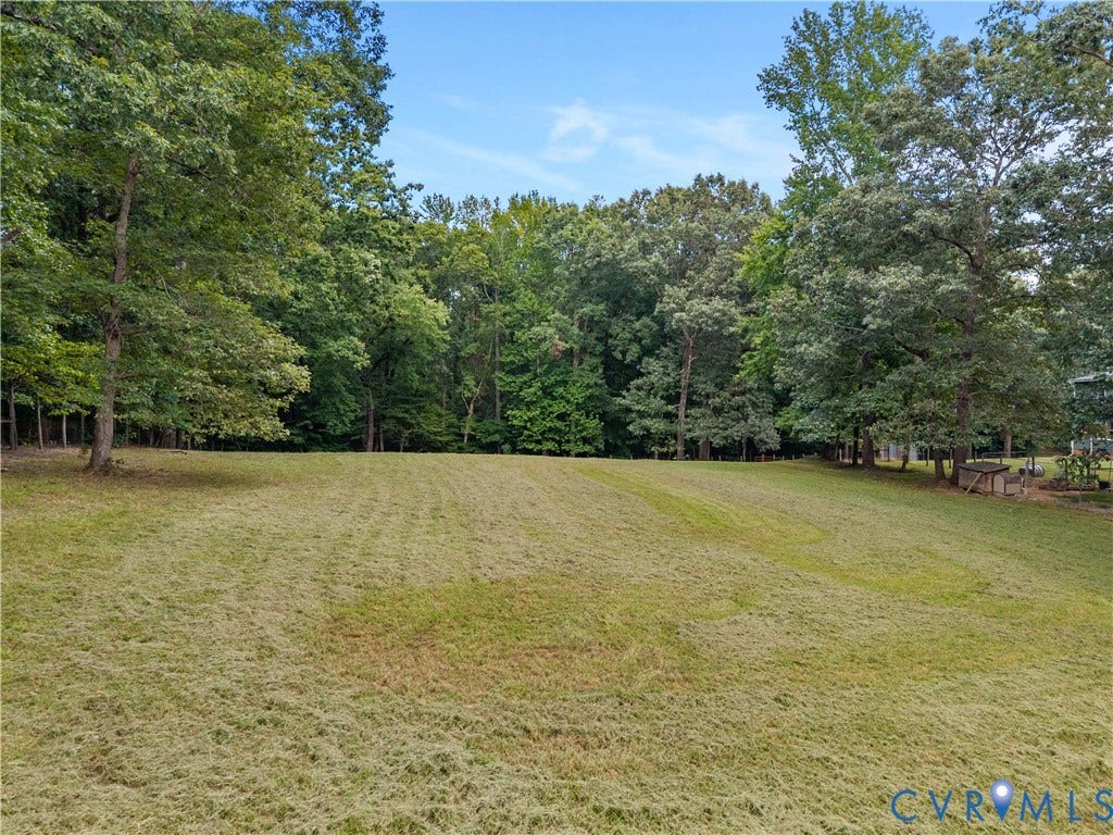 3927 Hughes Creek Road, Powhatan, VA 23139 Expansive grassy area with mature perimeter trees