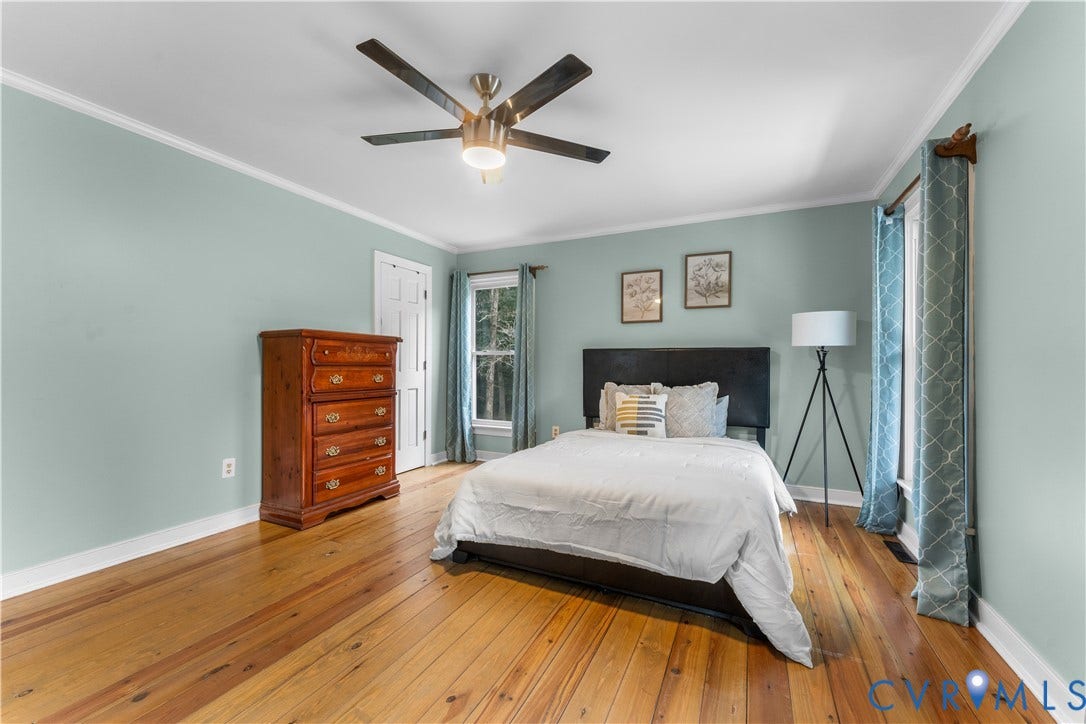 3927 Hughes Creek Road, Powhatan, VA 23139 Wood-finish flooring with light blue walls