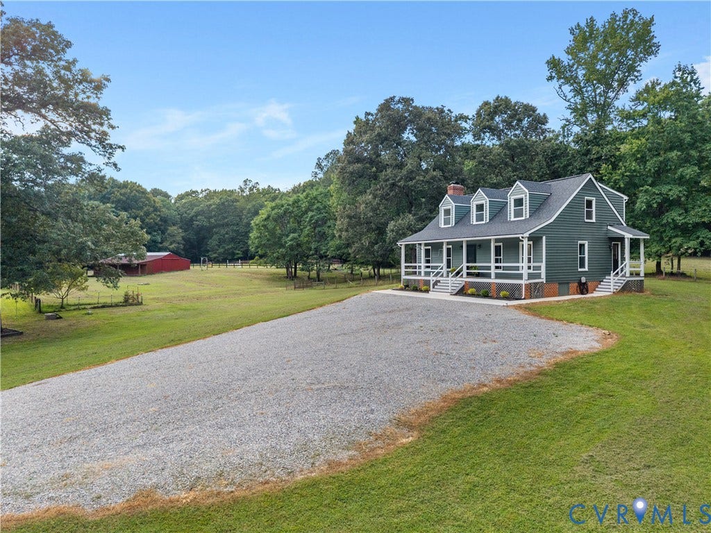 3927 Hughes Creek Road, Powhatan, VA 23139 Two-story residence with a deep green exterior and white trim