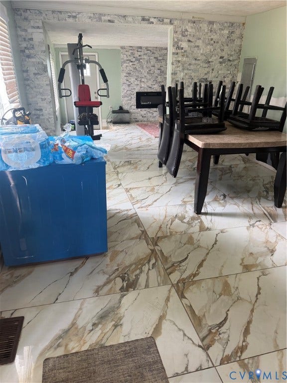 Large format tile flooring with a marble-effect pattern