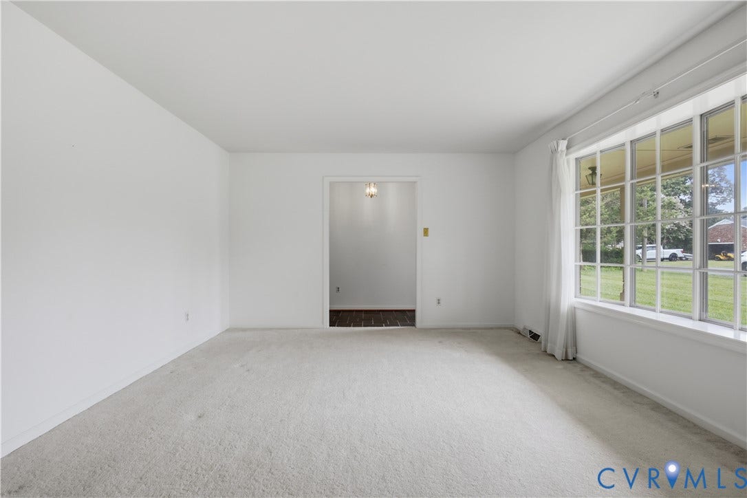 3641 Kiefer Road, Bermuda, Chester, VA 23831 Spacious room formal living room featuring light-colored carpeting and white wall finishes