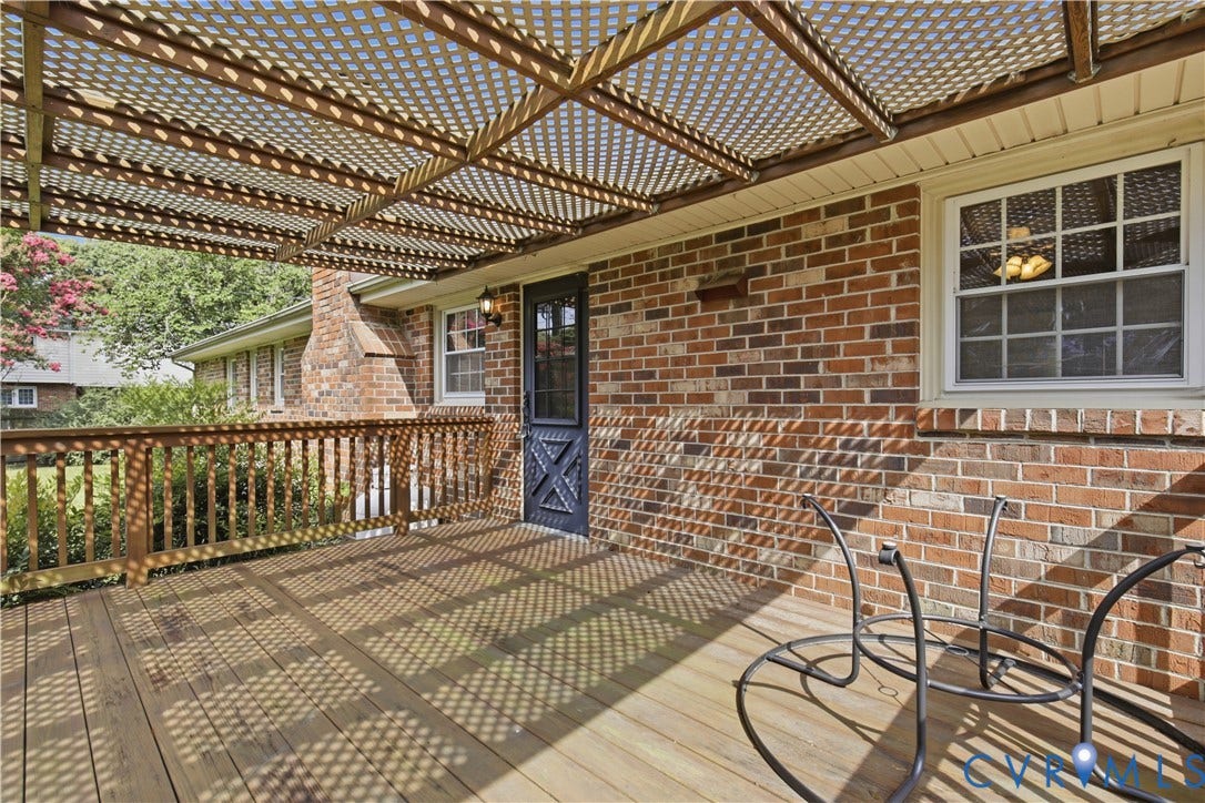 3641 Kiefer Road, Bermuda, Chester, VA 23831 Expansive wood-finish deck featuring a lattice pergola and wood railing
