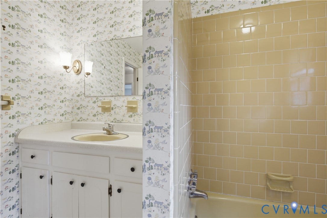 3641 Kiefer Road, Bermuda, Chester, VA 23831 Bathroom featuring a single vanity with a white countertop and yellow basin