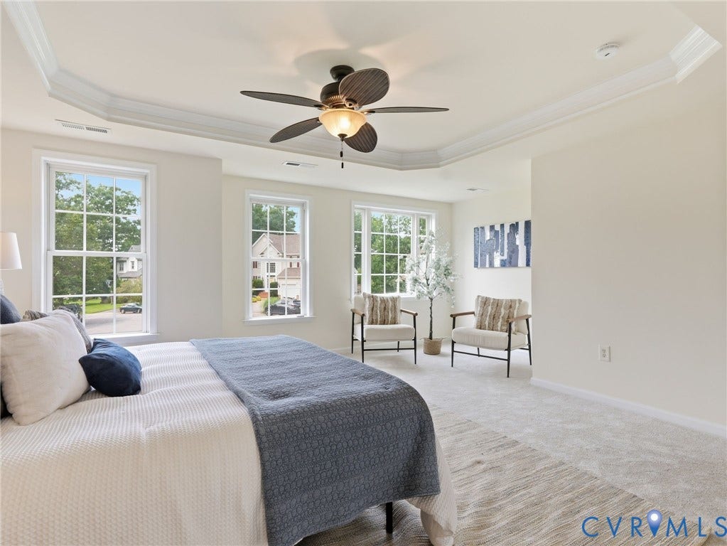 5707 Stephens Point Court, Chesterfield, VA 23831 Recessed ceiling with crown molding, ceiling fan, and abundant natural light from multiple windows