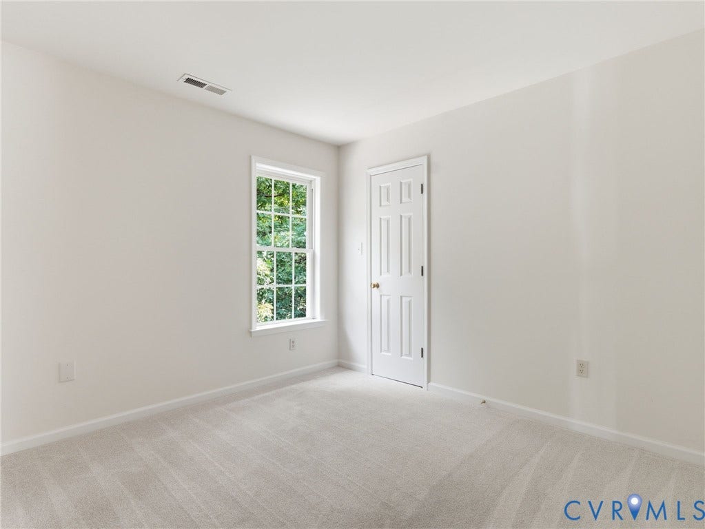 5707 Stephens Point Court, Chesterfield, VA 23831 Second Upstairs Bedroom with new carpet and paint.