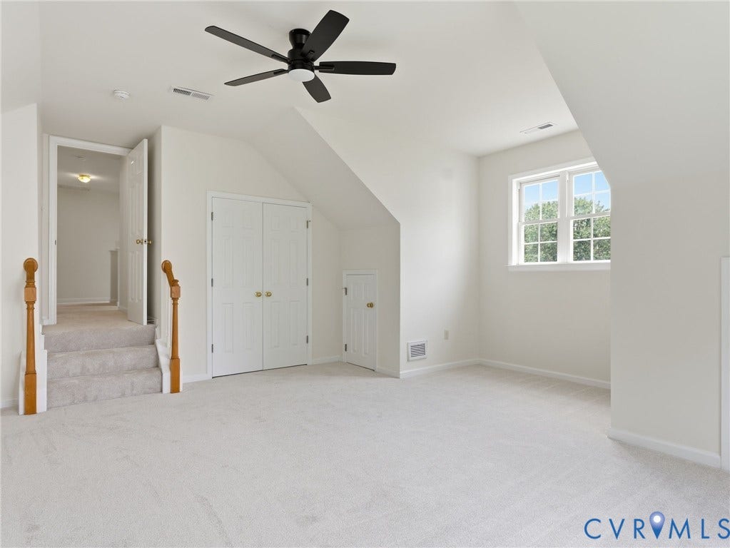 5707 Stephens Point Court, Chesterfield, VA 23831 Upstairs Fourth Bedroom/Bonus Room with new ceiling fan, carpet and paint.