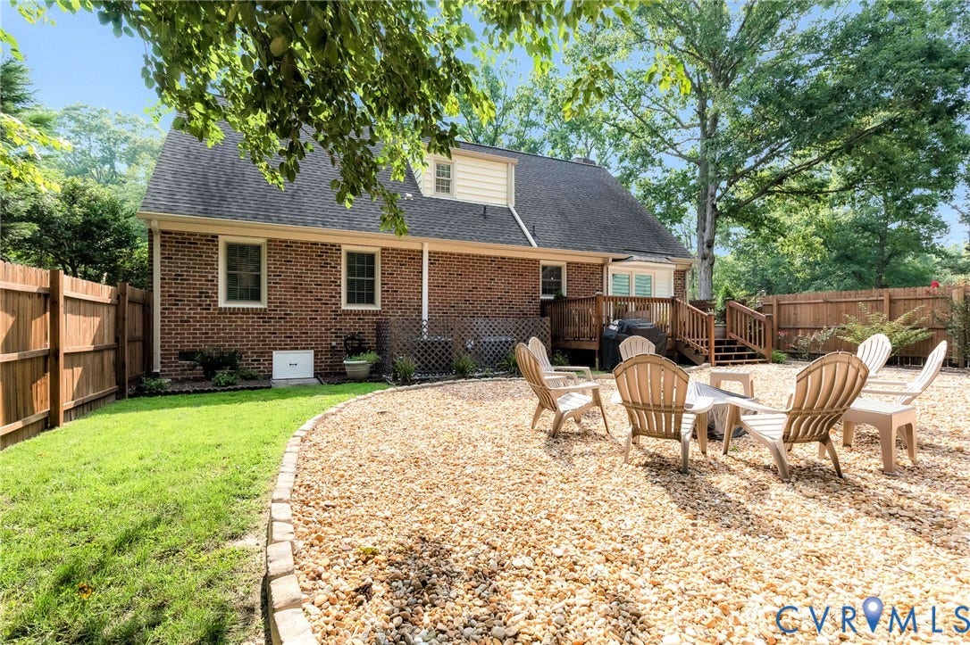 8800 Shewsbury Drive, New Kent, VA 23124 Brick exterior with dormer window and a multi-level wood deck