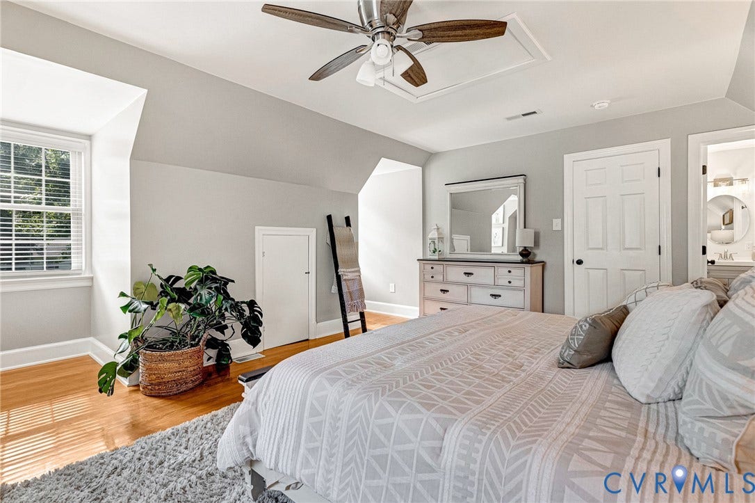 8800 Shewsbury Drive, New Kent, VA 23124 Hardwood-style flooring and a window with blinds provide natural light