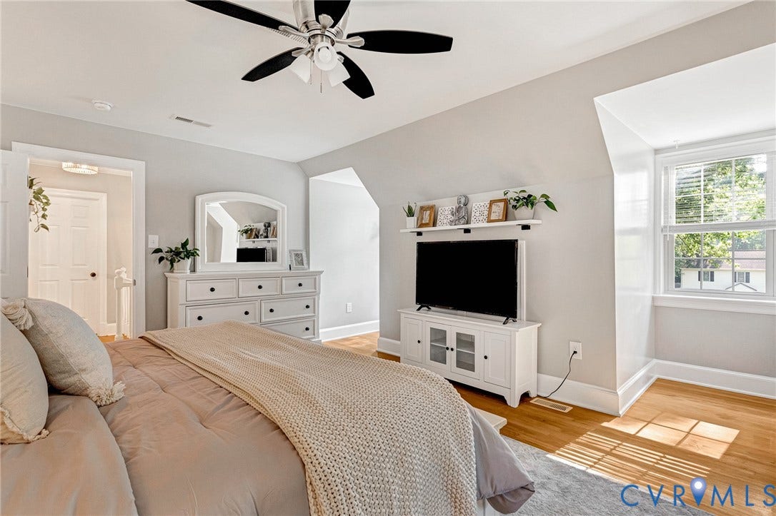 8800 Shewsbury Drive, New Kent, VA 23124 Hardwood-style flooring throughout this room with a ceiling fan