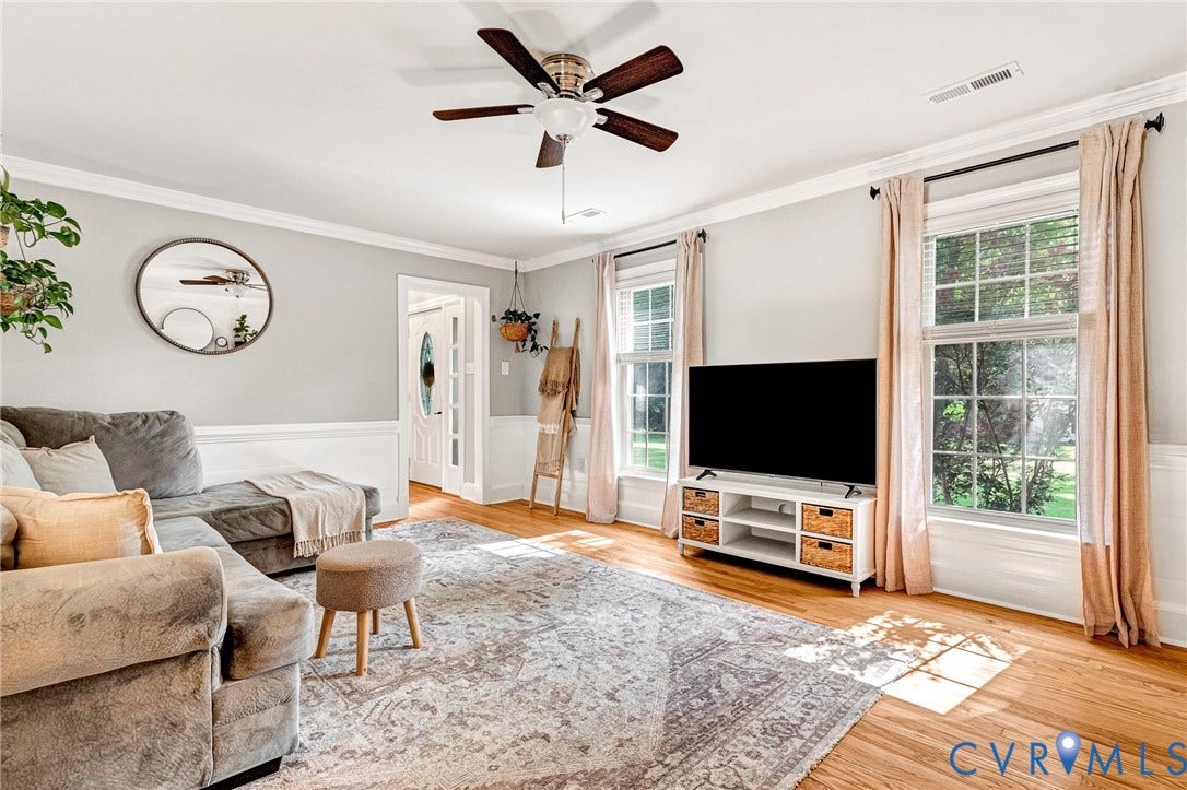 8800 Shewsbury Drive, New Kent, VA 23124 Hardwood flooring throughout featuring a ceiling fan with light fixture