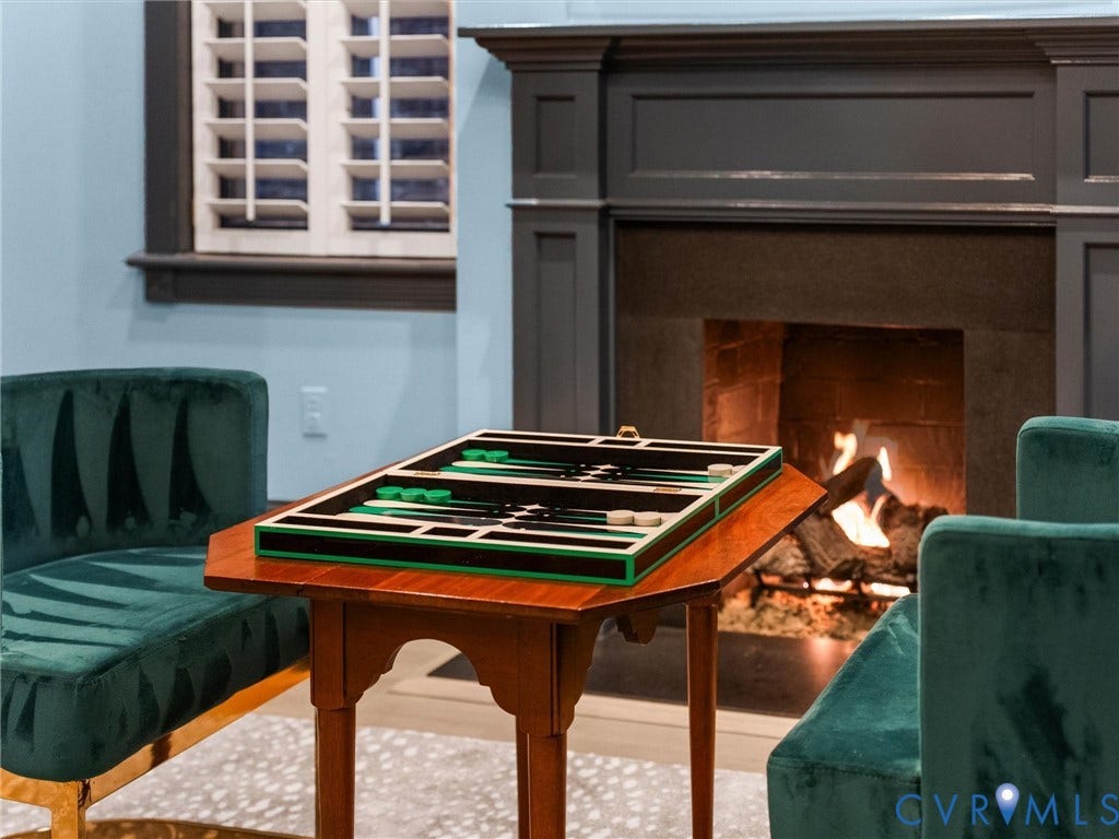 2242 Park Avenue, The Fan, Richmond, VA 23220 Close up on fireplace with mantel and Virginia Mist granite surround.