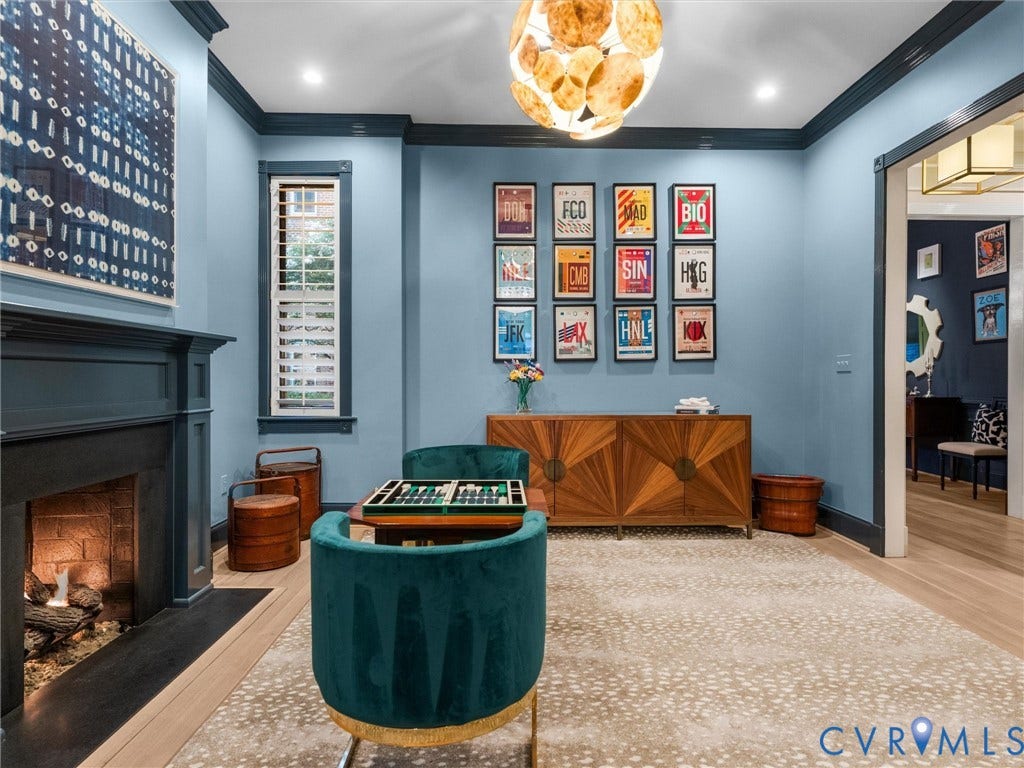 2242 Park Avenue, The Fan, Richmond, VA 23220 Second parlor with gas fireplace, mantel and chandelier.