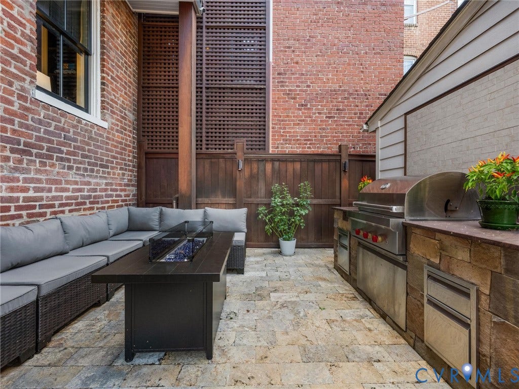 2242 Park Avenue, The Fan, Richmond, VA 23220 Rear patio with travertine tile, built-in grill and cabinets