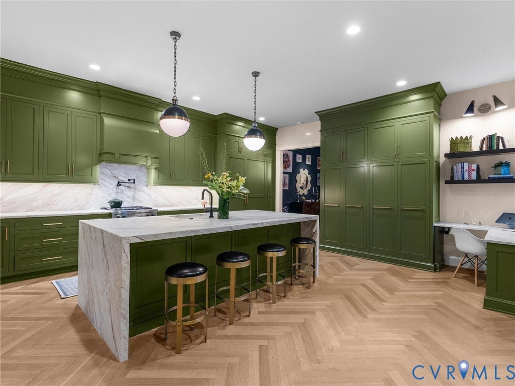 2242 Park Avenue, The Fan, Richmond, VA 23220 Kitchen with bar seating and custom cabinets below.