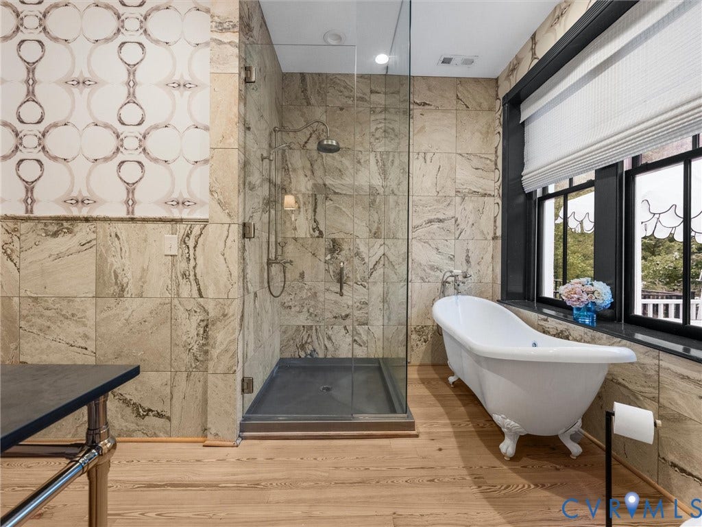 2242 Park Avenue, The Fan, Richmond, VA 23220 Primary bath offers clawfoot tub and shower.
