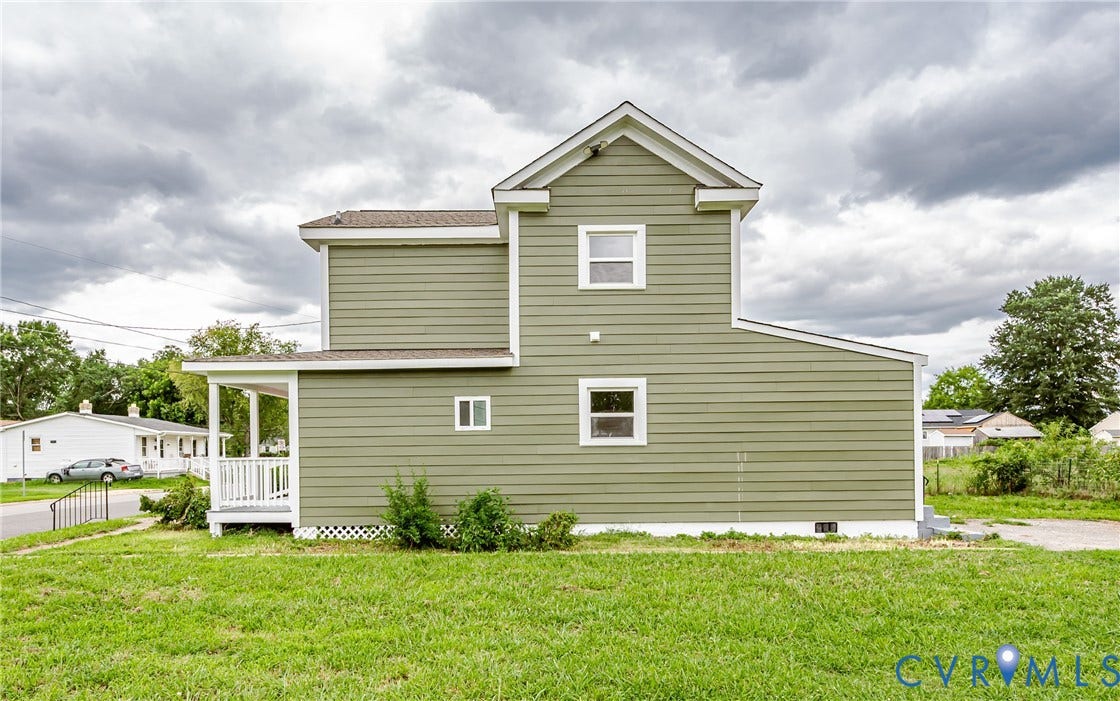 3903 Delmont Street, Henrico, VA 23222 Two-story residence with green siding and white trim